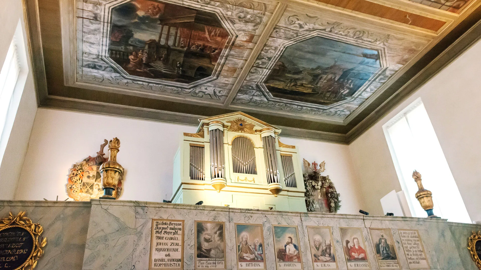 Baroque Hall with ceiling paintings and an organ