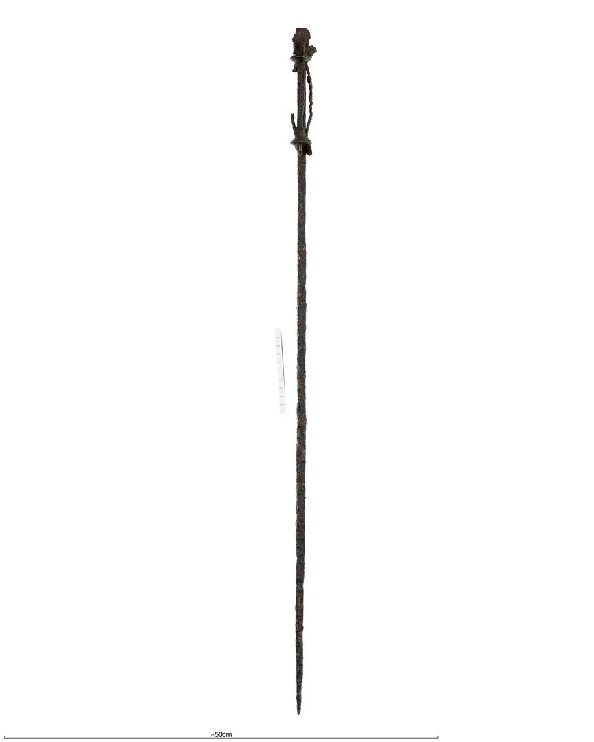 Iron staff with a knobbly end.