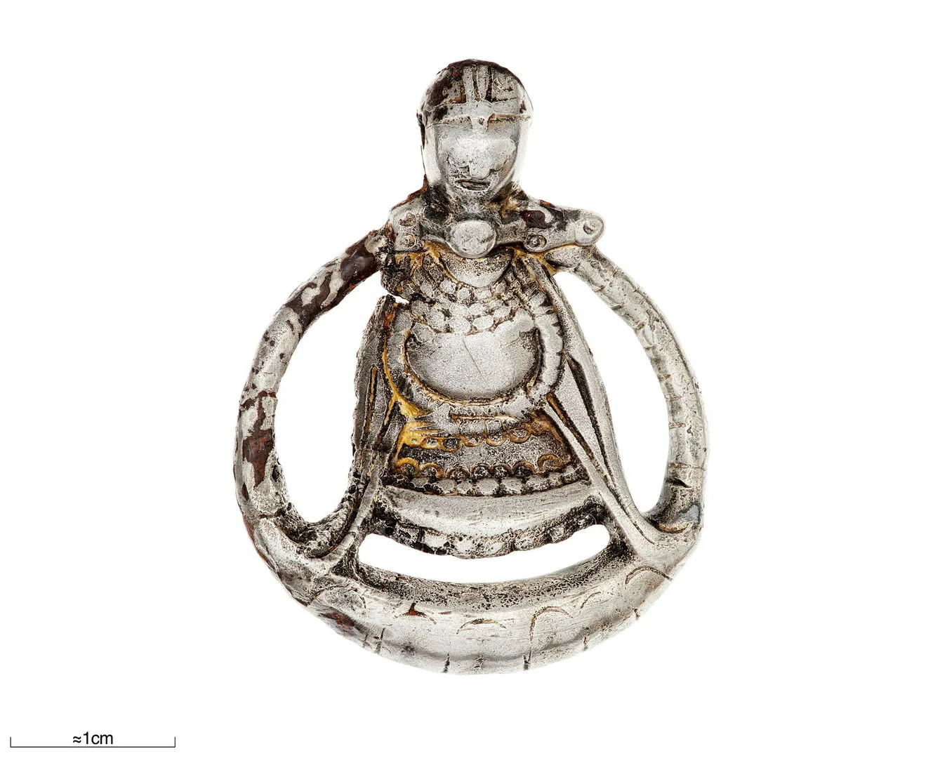 Pendant of silver depicting a woman.