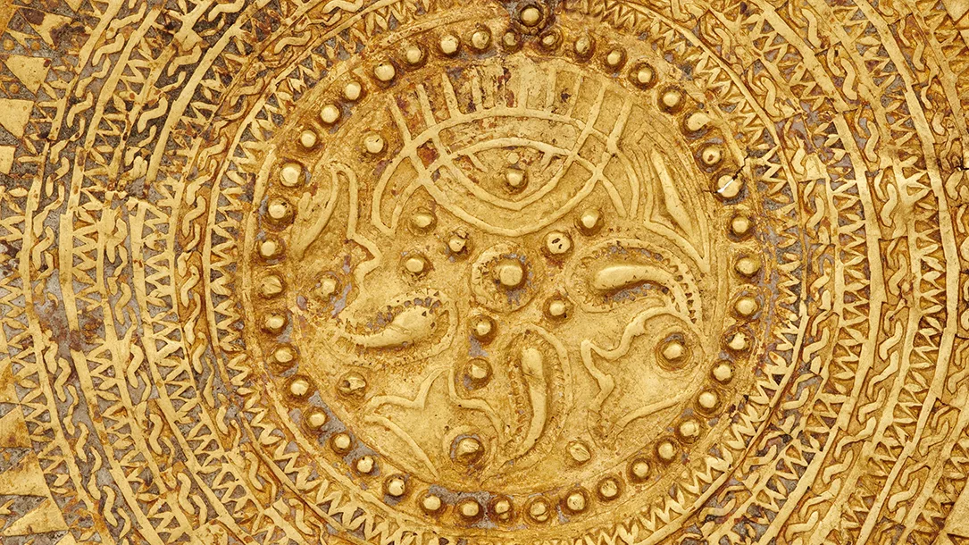Detail of a filigree- and stamp-decorated gold bracteate