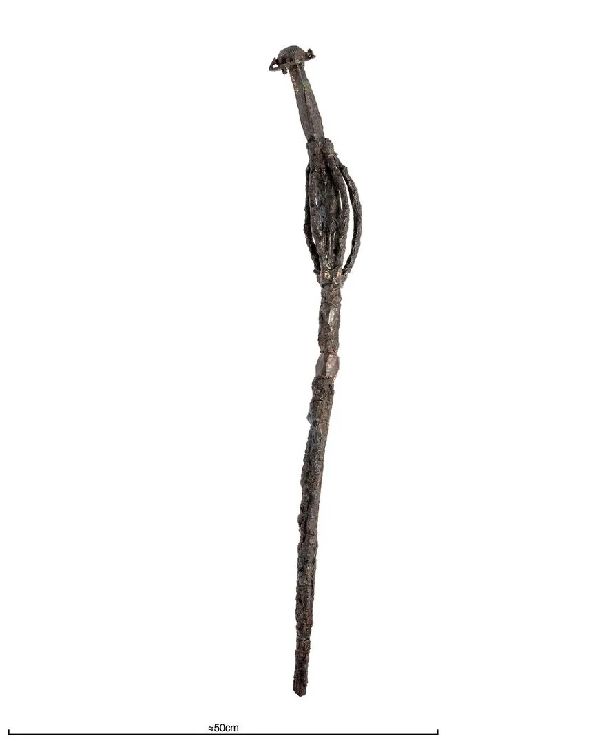 Iron staff with details of copper and bronze.