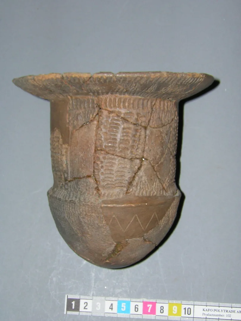 A clay vessel with a flat and wide rim
