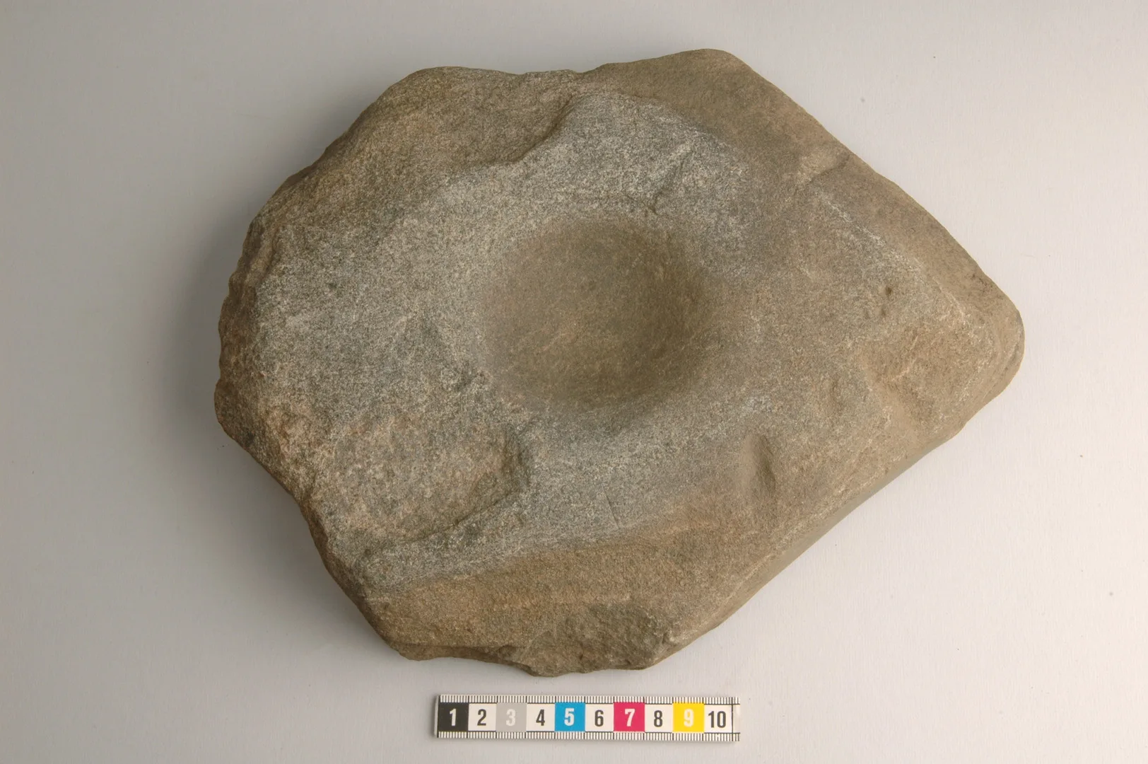 A cup-marked stone
