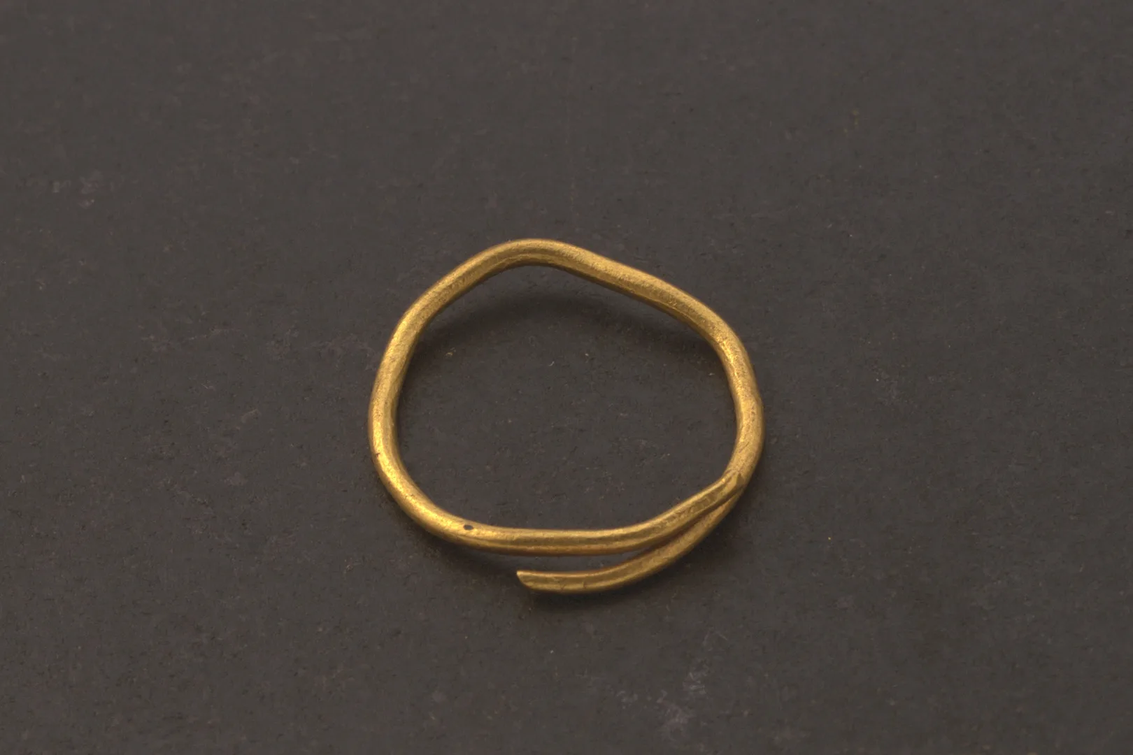 A gold ring made of a twisted rod