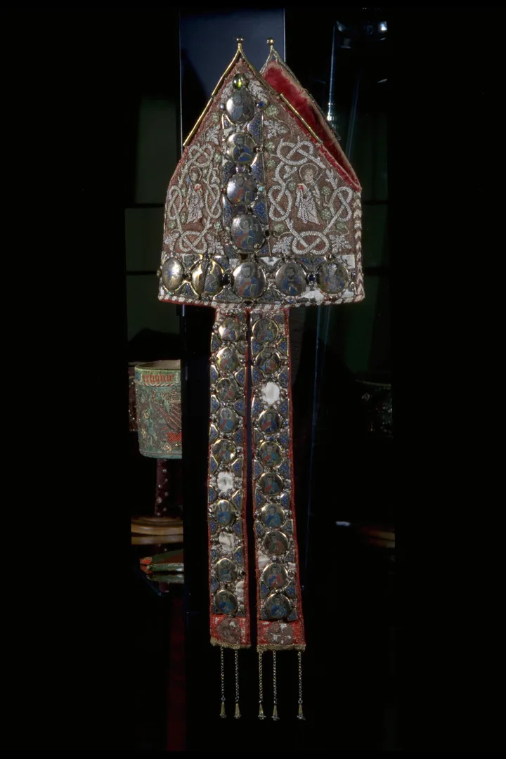 Tall, pointed ceremonial bishop’s hat.
