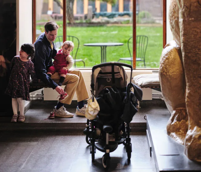 A family with a stroller.