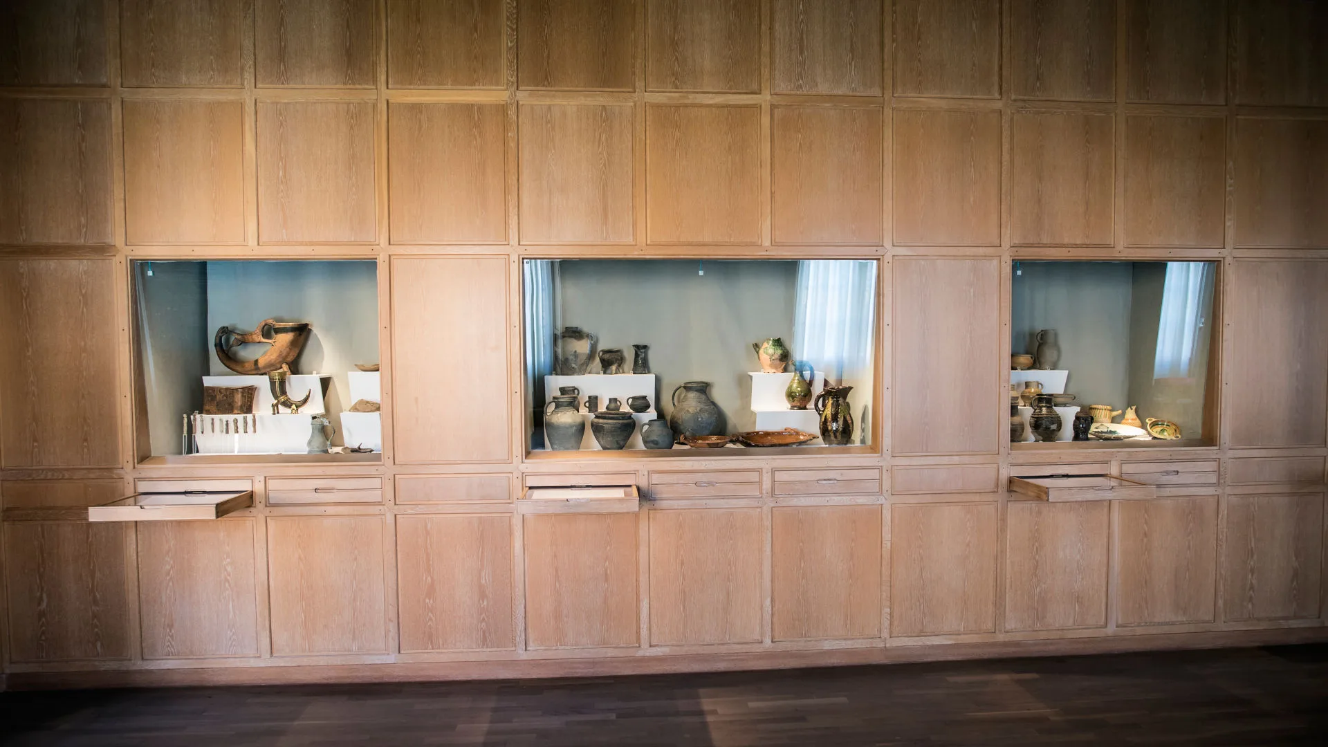Display cases in the exhibition Medieval Life.