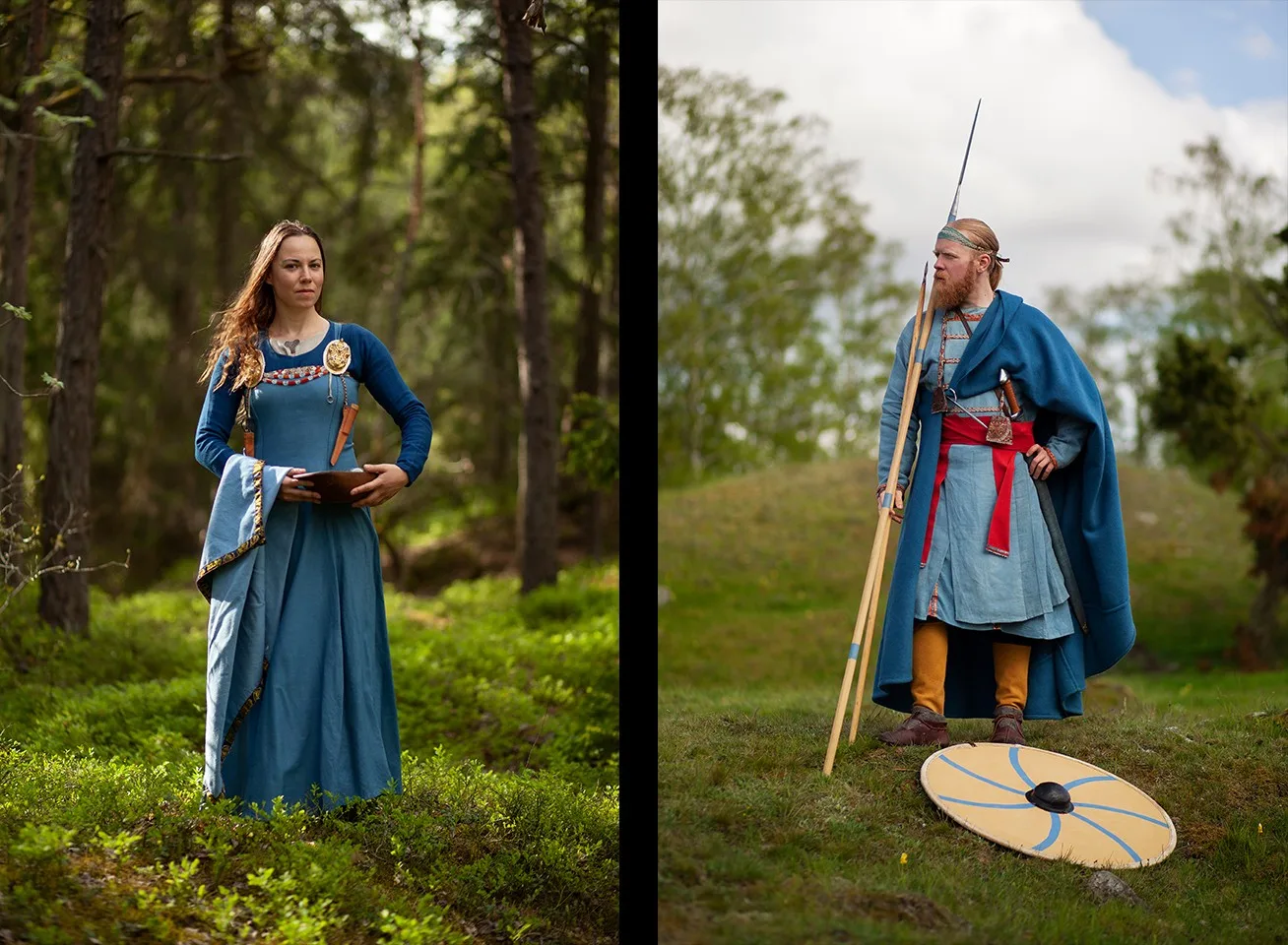 People in reconstructed Viking Age clothes. On the left, a woman's outfit with large gold buckles. On the right, a man with and a spear and shield.