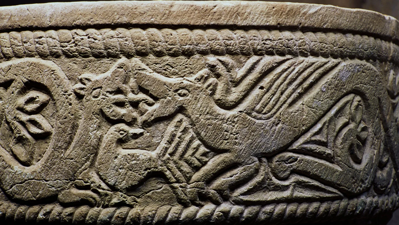 animals depicted on a stone basin
