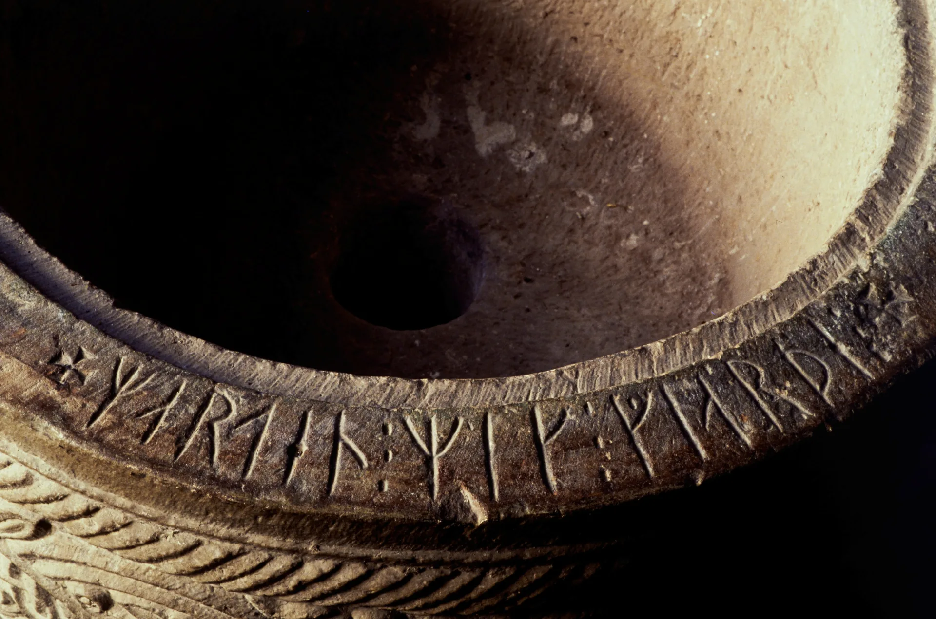 Runes on a stone basin