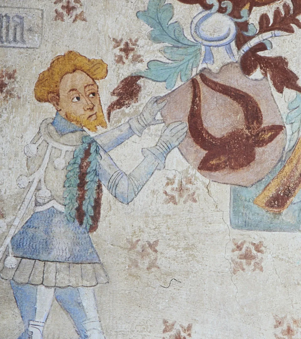 Kalkmålning av man med sköld