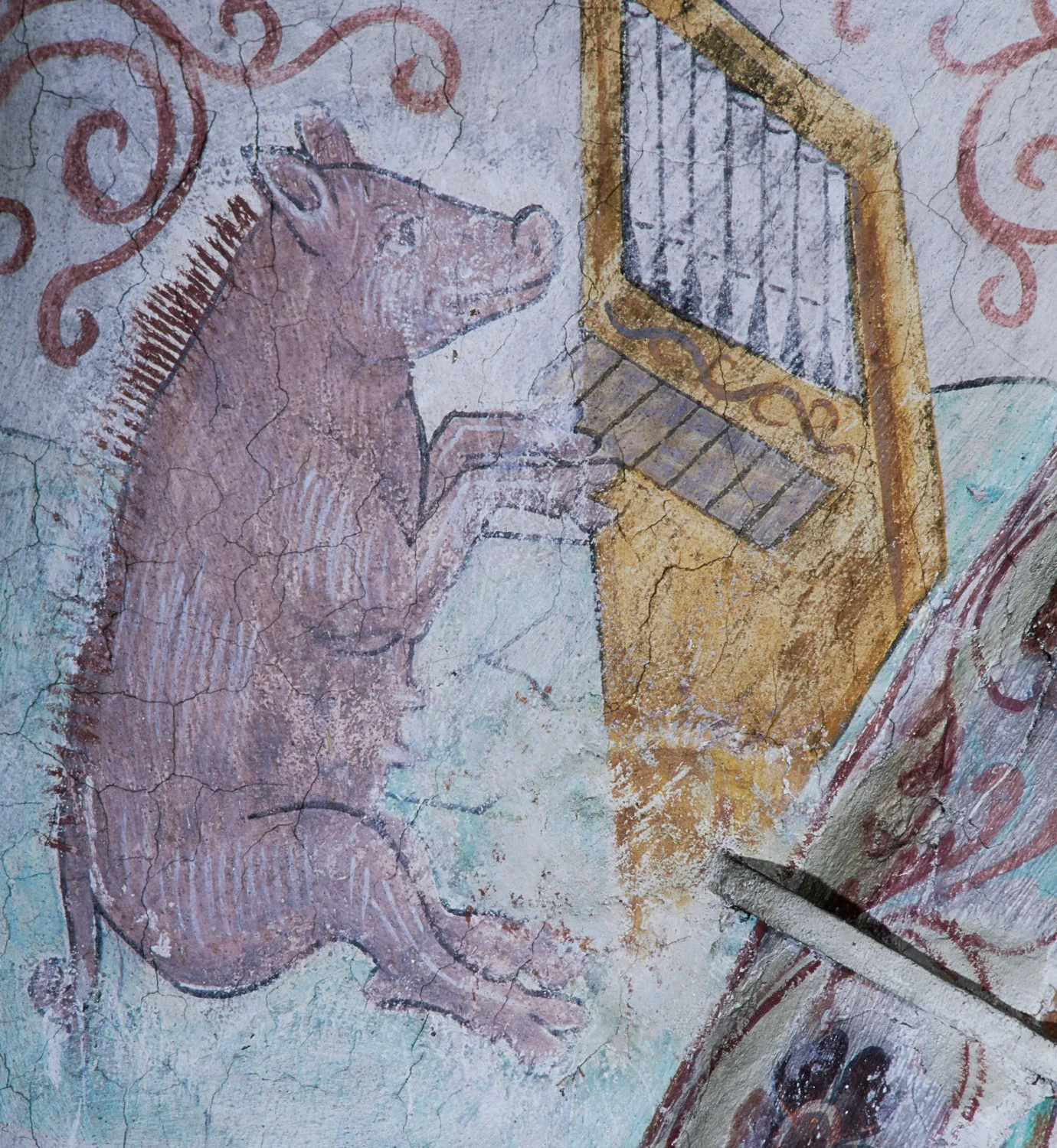 A pig or a boar playing the pipe organ