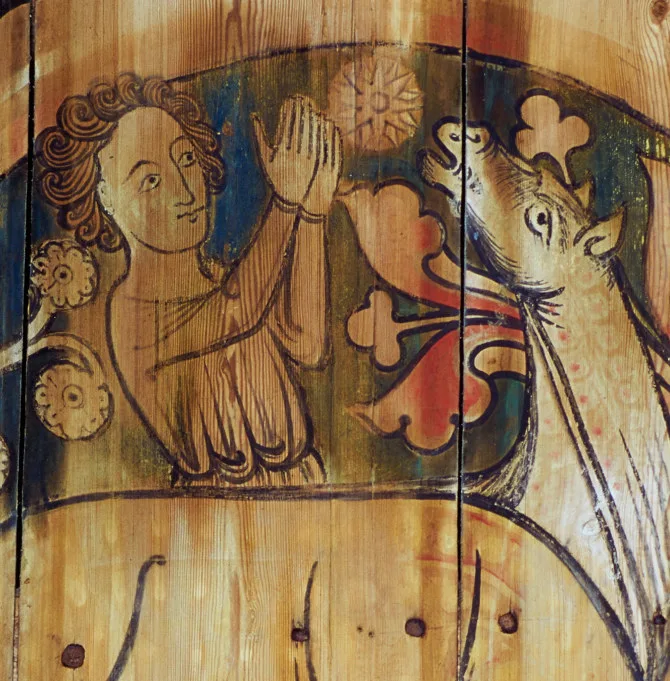 Painting of a person appears to be feeding a house