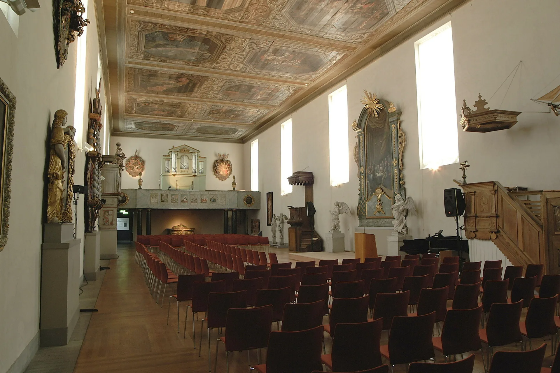 The interiors of The Baroque Hall, prepared for a conference with chairs lined up 