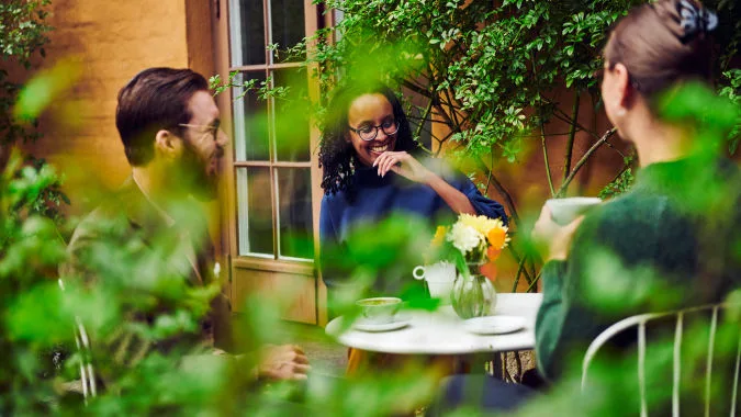 Visitors sitting outside in the restaurant’s courtyard.