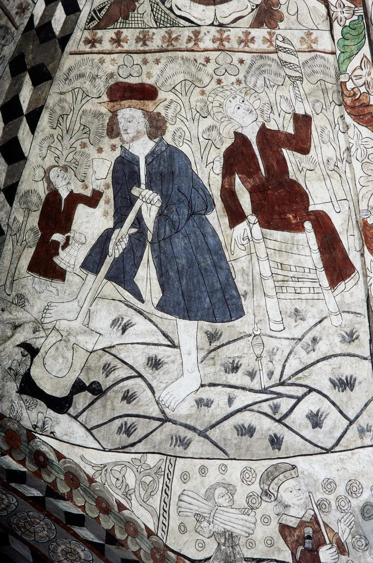 A man working with a shovel and a pregnant woman spinning yarn.