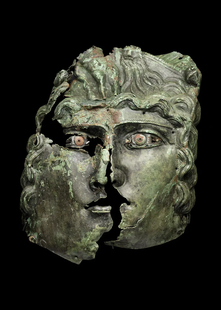 cracked Roman cavalry mask in bronze