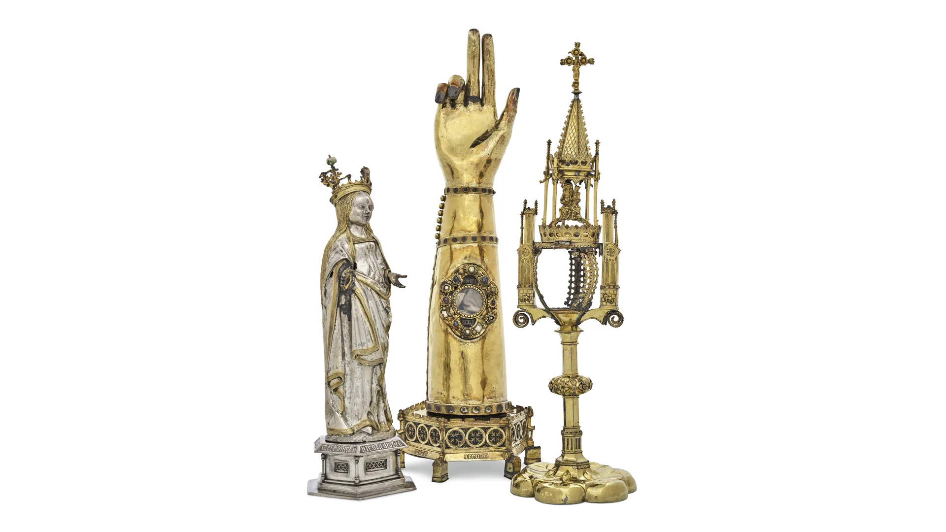 Gold artefacts lined up in a row