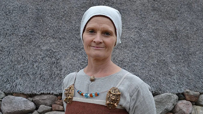 Person in Viking Age clothes and jewellery