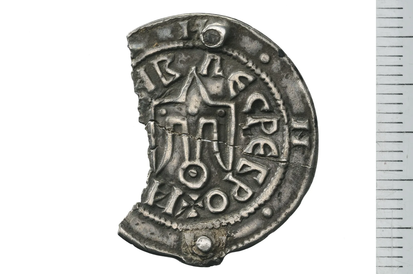 Silvermynt med fågelsymbol