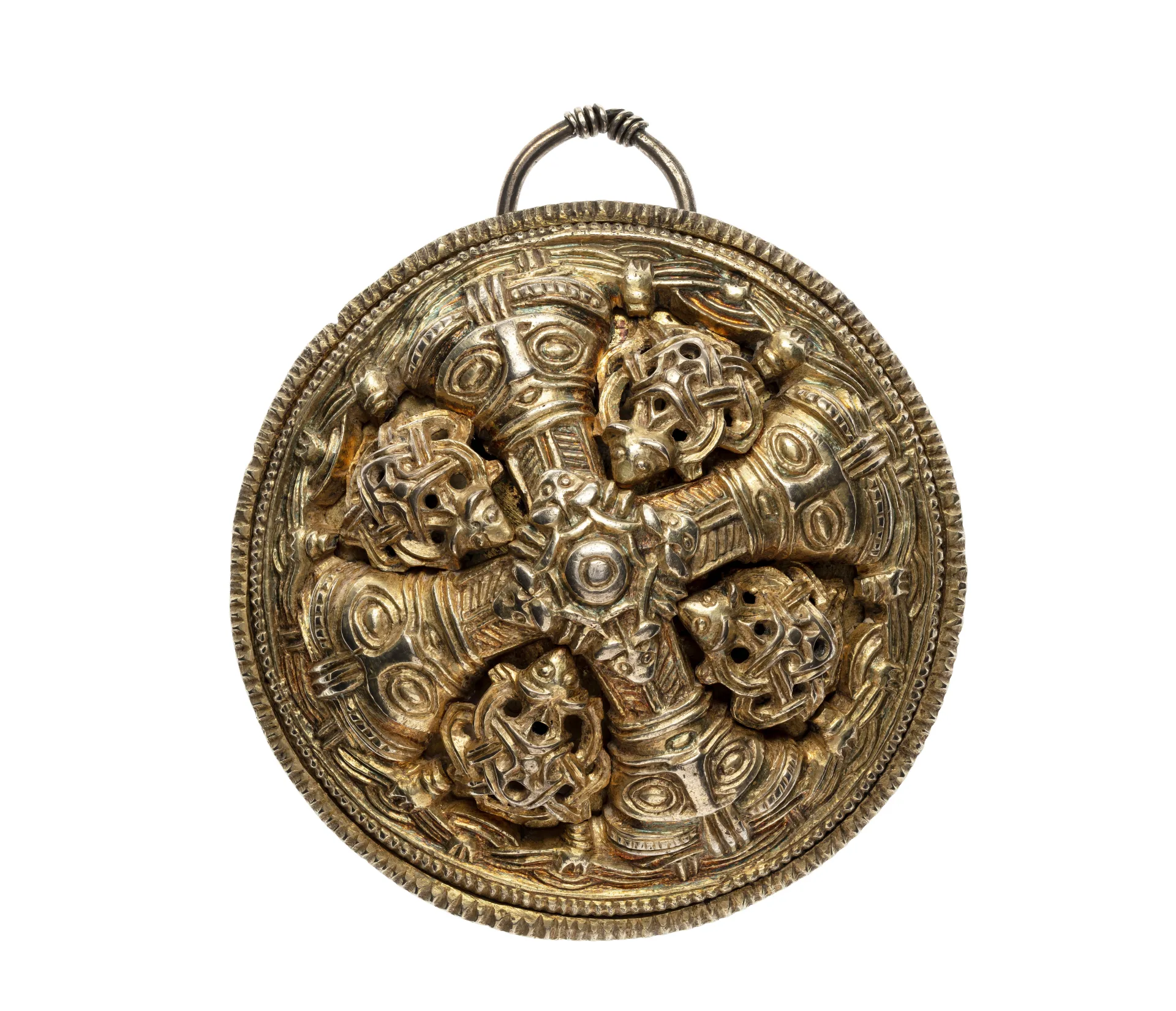 Round brooch featuring ornaments