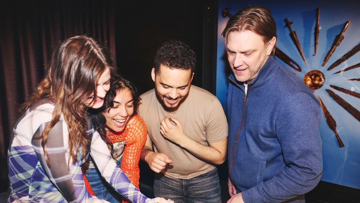 Four people looking together