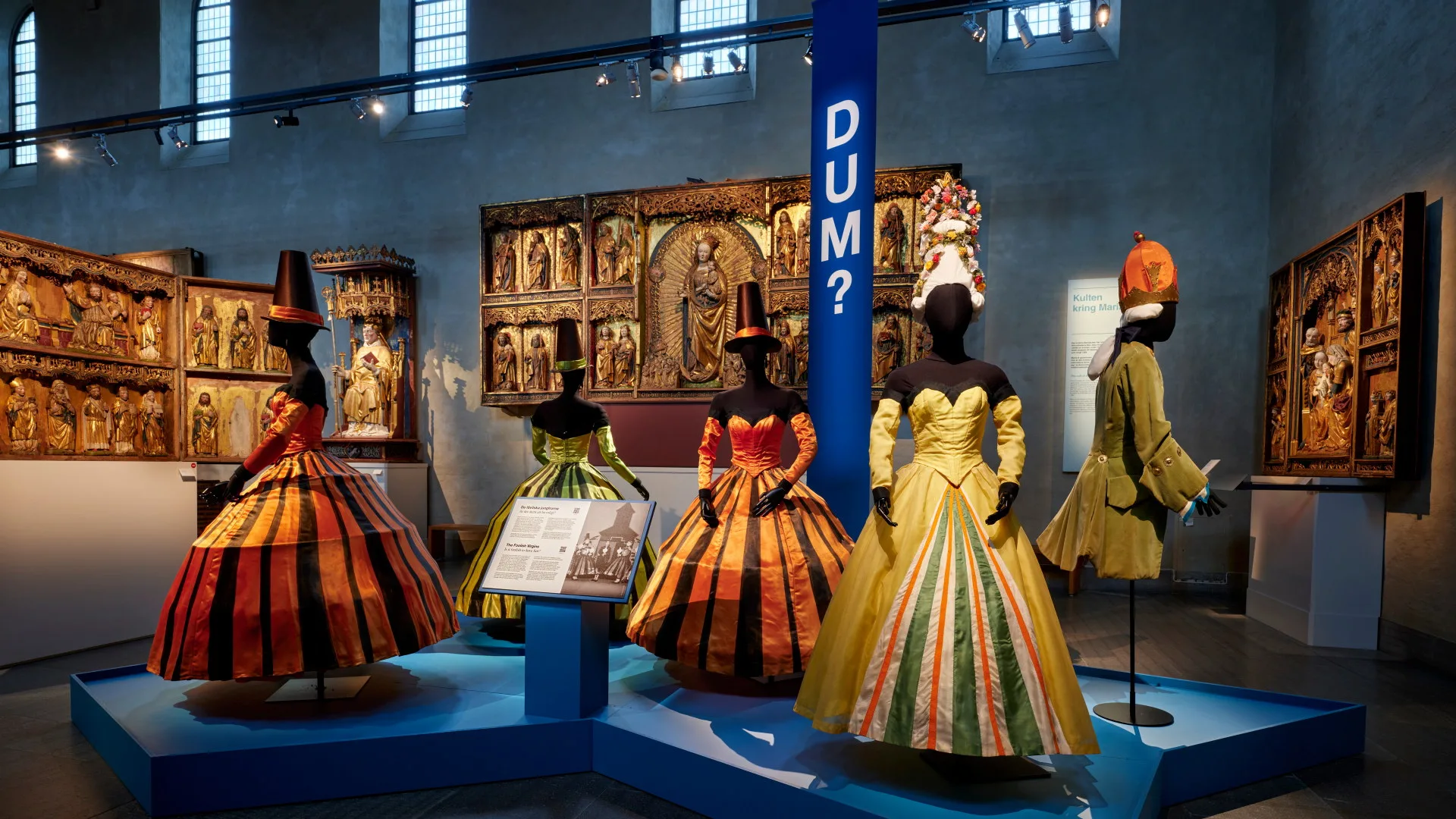 Exhibition with colorful costumes and altarpieces